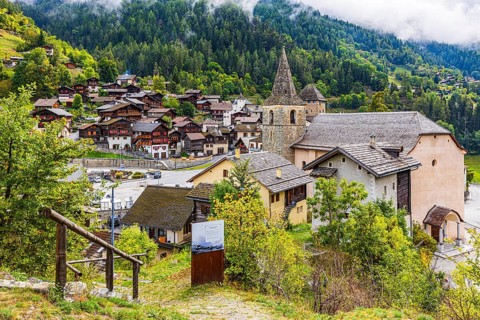 The mountain village of Vissoie with the Sainte-Euphemie church, Val d'Anniviers, Valais Alps,