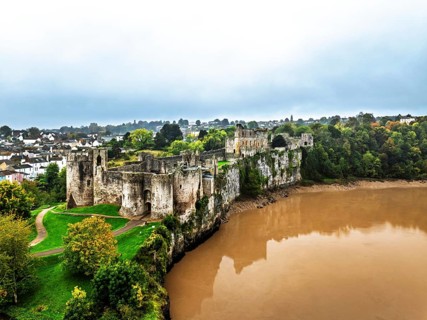 Autumn over Chepstow Castle and River Wye from a drone, Chepstow, Monmouthshire, Wales, UK