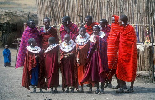 Maasai men and girls in their village in Ngorongoro Crater, Tanzania, Africa, June 2000, vintage,