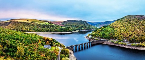 Autumn over Garreg Ddu Dam from a drone, Elan Valley, Caban-Coch Reservoir, Rhayader, Wales, UK