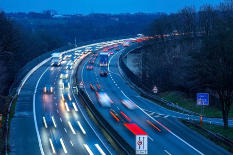 Evening traffic on the A52 motorway, between Düsseldorf and Essen, at the Ruhr Valley Bridge,