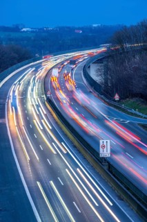 Evening traffic on the A52 motorway, between Düsseldorf and Essen, at the Ruhr Valley Bridge,