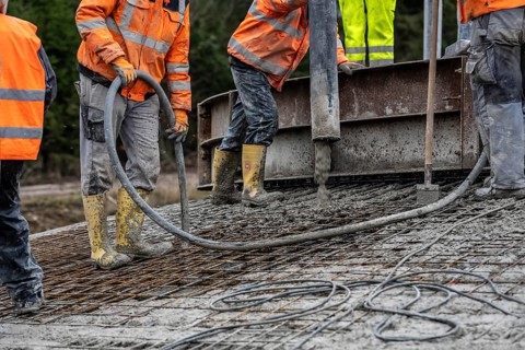 Concreting, concreting the foundation of a wind turbine, concrete pump hose, compressor, more than