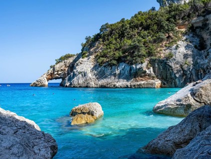 Light blue clear sea on a dream beach on Cala Goloritzé, picturesque rocky coast, cliffs with rock