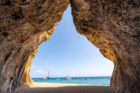 Rock cave on the beach at Cala Luna, Golfo di Orosei, Baunei, Sardinia, Italy
