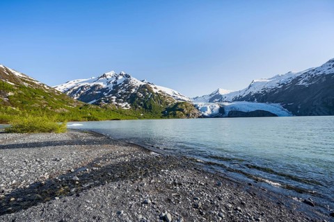Snowy mountains and glaciers Portage Glacier on Portage Lake glacial lake, Chugach National Forest,