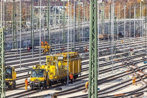 Rail construction crews with a work train. New parking station in Untertürkheim. As part of