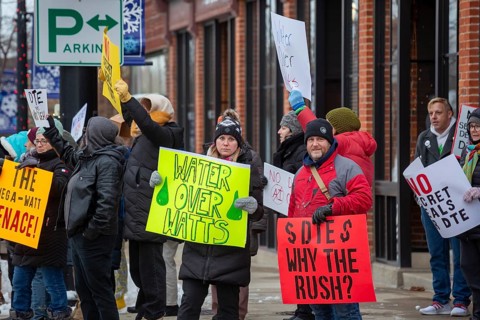 Saline, Michigan USA - 1 December 2025 - Rural Michigan residents rally against the $7 billion