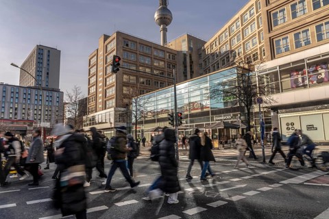 Passers-by on a Grunerstraße pedestrian crossing near Alexander Platz, Berlin Radio Tower, Berlin,