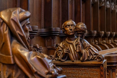 The choir stalls in Ulm Minster by Jörg Syrlin the Younger with impressive carvings. interior view.