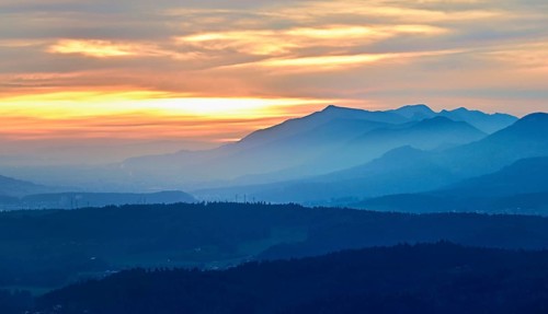 View of the Jura foothills from the Gisliflue, in the light of the setting sun, Talheim, Canton,