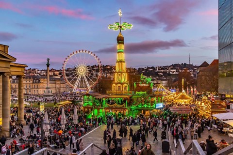 Sunset at Stuttgart's Christmas market in the Schlossplatz area. With around 3.5 million visitors,