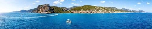 Panorama, picturesque rocky coast, cliffs and Cala Luna beach, aerial view, Golfo di Orosei,