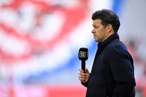 TV expert Michael Ballack interviewed microphone in front of logo FC Bayern Munich, Allianz Arena,
