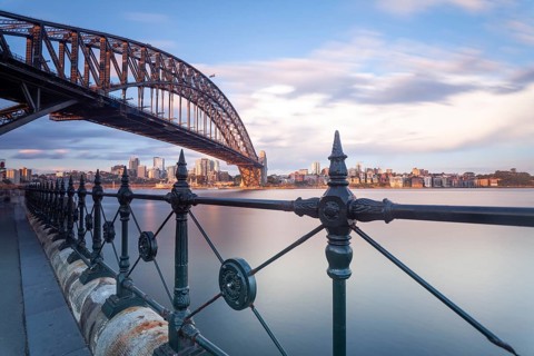 The Sydney Harbour Bridge and CBD skyscrapers in the evening light. View of Sydney's Central
