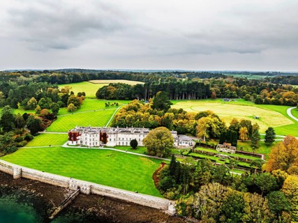 Autumn over Plas Newydd House from a drone, Gardens and Parkland, Llanfairpwllgwyngyll, Anglesey,