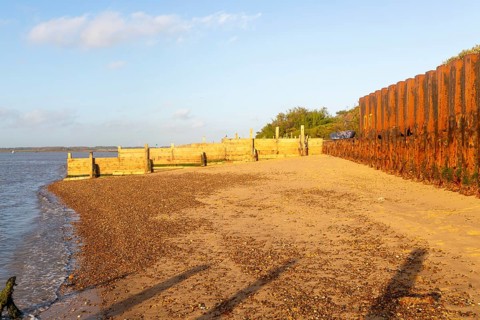 Temporary coastal defences erected by Bawdsey Haven Yacht Club, response to rapid erosion beach