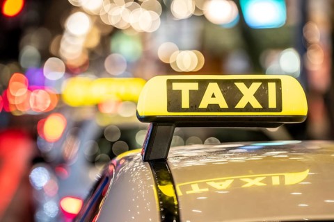 Taxi stop, on Tauentzienstraße in Berlin, in the evening, Germany