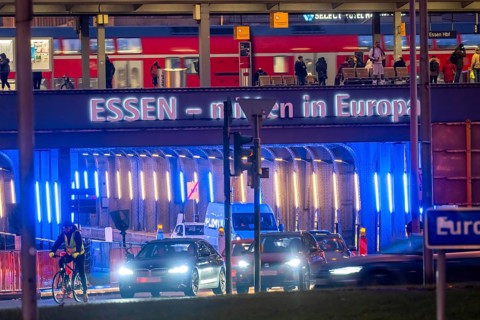 The main train station in Essen, blue-lit underpass, bus station, am Europaplatz, public transport