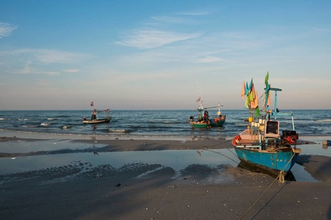 Colorful fishing boats on beach, sunset, Hua Hin, Prachuap Khiri Khan, Central Thailand, Thailand
