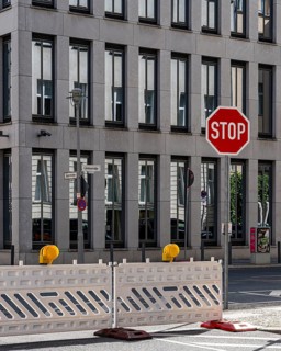 Barriers and signs with traffic signs at road construction sites in Berlin Mitte, Berlin, Germany