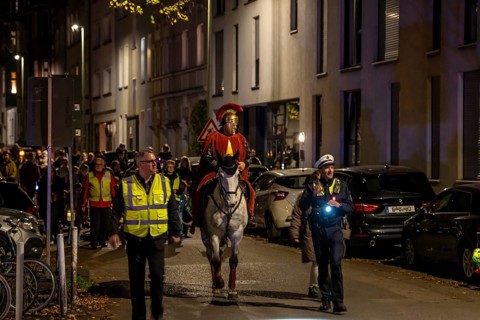 Martinszug in Essen-Rüttenscheid, the parish of St. Lambertus, Saint Martin actor on a horse, with