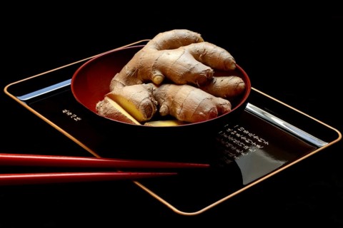 Ginger, ginger root in tea bowl, Zingiber officinale, tea preparation