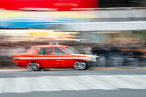 Black taxi driving, motion blur, long exposure, Shubuya Crossing, Shibuya, Tokyo, Japan