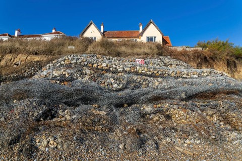 Clifftop houses at risk from coastal erosion, Thorpeness, Suffolk, North Sea coast, England, UK