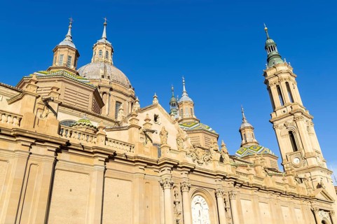 Towers and domes on roof of Basilica of Our Lady of the Pillar cathedral church, Zaragoza, Aragon,