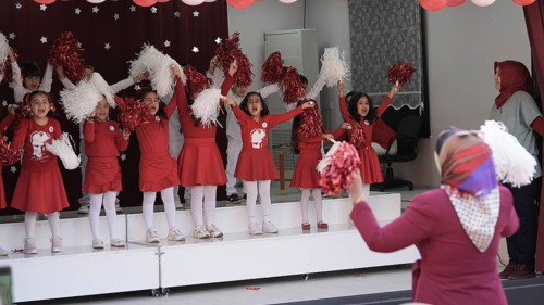 Children celebrate the 102nd anniversary of the Republic Day of Turkey, a national holiday