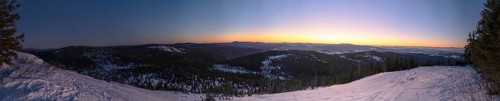 View from Mount Lusen over the hills of the bavarian forest at sunrise in winter, Bavaria, Germany