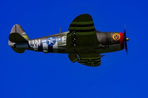 An RC model of a Republic P-47 Thunderbolt during a demonstration as part of an air show at the
