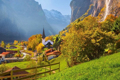 View of town and valley with Staubbach waterfall in autumn, Lauterbrunnen, Bernese Oberland, Canton