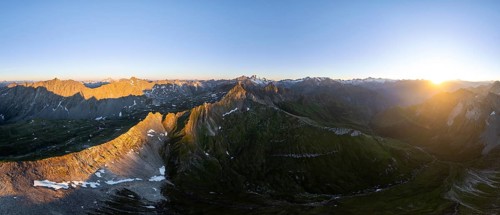 Sunrise 360° Alpine panorama, aerial view of Bachlenkenkopf, summit of the Großvenediger, Venediger