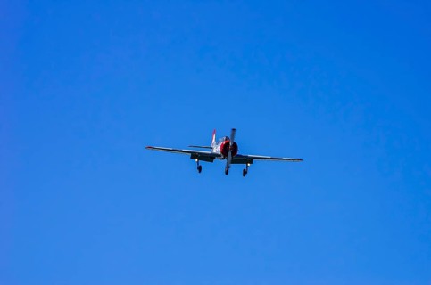 A Jakovlev Jak-52 with registration LY-HLZ during a flight demonstration as part of an air show on