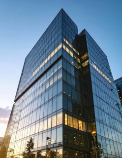 Modern building reflecting sunset light at dusk. Abstract Futuristic Business Background, AI