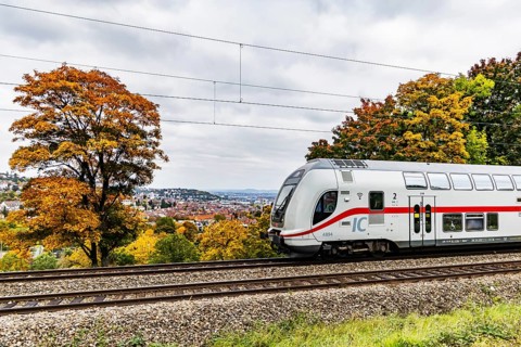 InterCity operated by Deutsche Bahn AG on the road between Stuttgart and Singen. The panoramic
