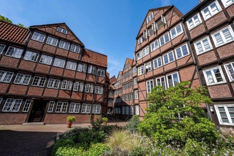 Facades of the historic brick buildings, inner courtyard, view over the city, Peterstraße,