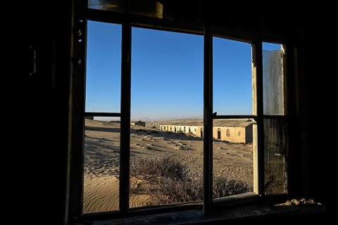 View from a former dwelling house into the desert, Kolmanskop, restricted diamond area, Karas
