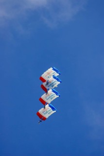 Parachutists during an aerial acrobatic demonstration as part of an air show on the Rossfeld in