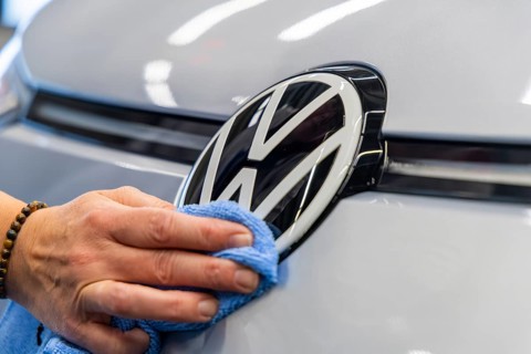Electric car production in the assembly halls of VW in Zwickau. VW logo, Zwickau, Saxony, Germany
