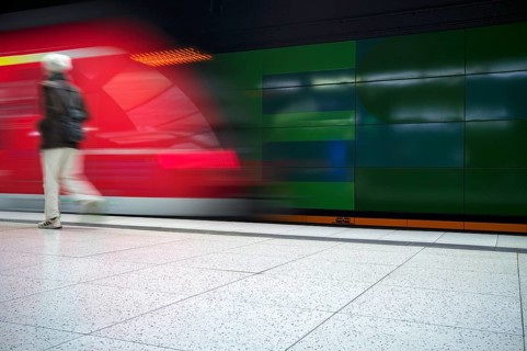 Underground arriving S-Bahn, train, class 420 in traffic red, platform, stop, Stadtmitte station,