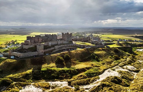 Bamburgh Castle from a drone, Northumberland, Northeast Coast, England, United Kingdom