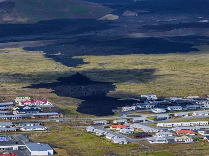Lava, lava field, village, houses, summer, cloudy, sunny, aerial view, volcanic eruption, July