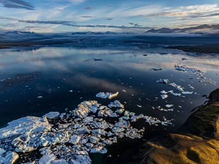Ice floes, glacier, glacier tongue, fog, clouds, morning mood, mountains, reflection, aerial view,