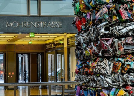 Interior design, artwork made from compressed scrap cars, partially vacant Shopping Quartier 205 in