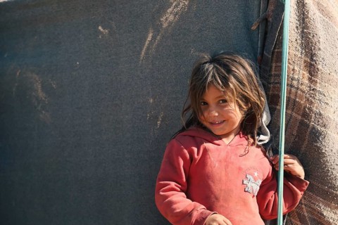 Syrian children playing in a refugee camp near the Turkish border on World Children's Day. Aleppo,