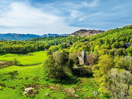 Holy Trinity Church from a drone, Bog Lane, Brathay village, Lake District, Cumbria, England,