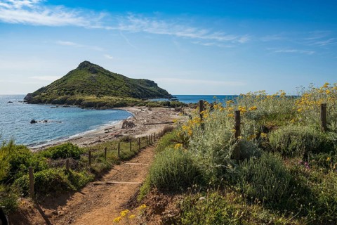 Picturesque coastal hiking trail and wild beach, Sentier du littoral, Plage Ranc, Cap Taillat,